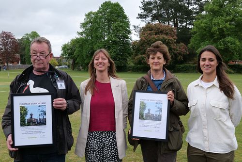 Celebration in Storrington: EuroNatur Project manager Dr Justine Vansynghel (2nd from left) presents the membership certificates for the European Stork Village Network. Also pictured: Mark Cramer, Chair of Storrington and Sullington Parish Council; Isabella Tree, Knepp Rewilding; Laura Vaughan-Hirsch, White Stork Manager Knepp (from left to right) © Anja Arning Ceremony in the stork village of Storrington